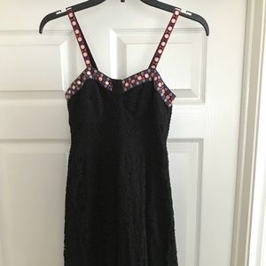 Black lace dress with intricate neckline